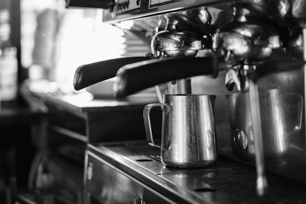 stainless steel kettle on table