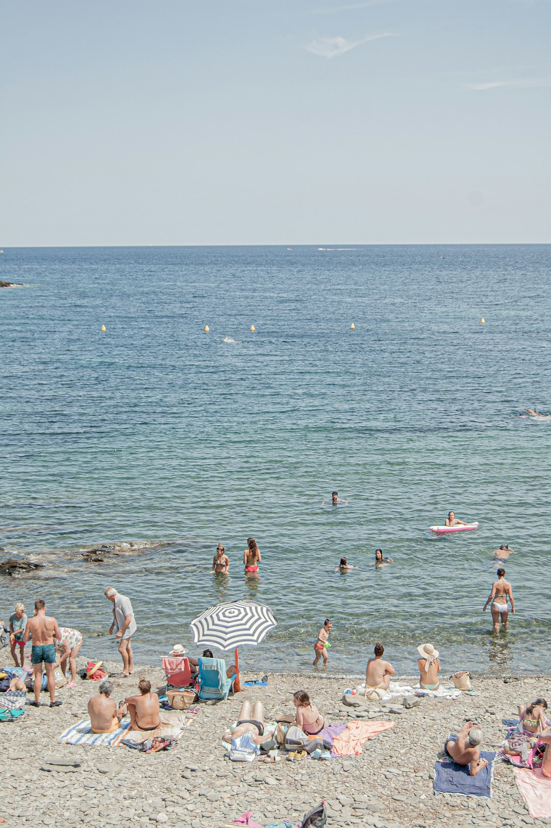 people in body of water during daytime