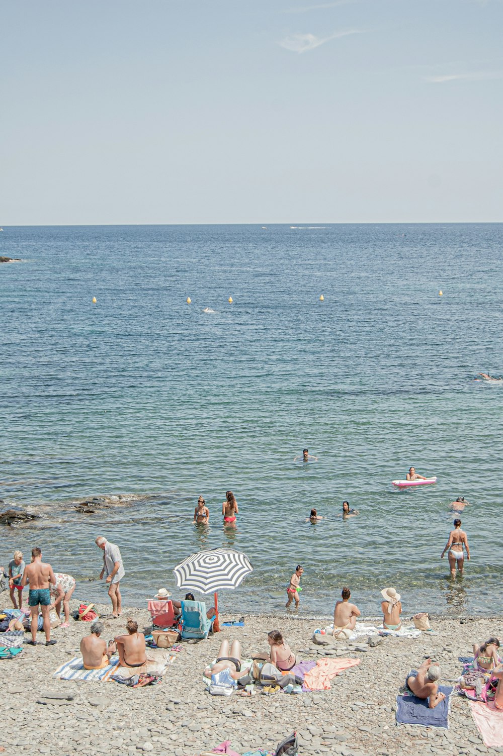 people in body of water during daytime