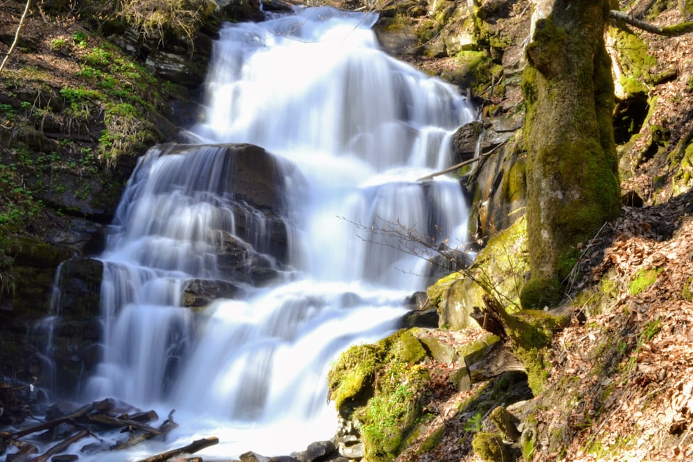 time lapse photography of waterfalls