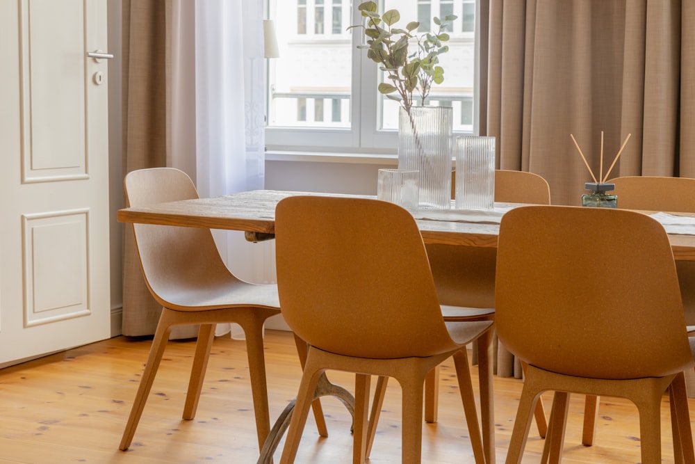 brown wooden table and chairs