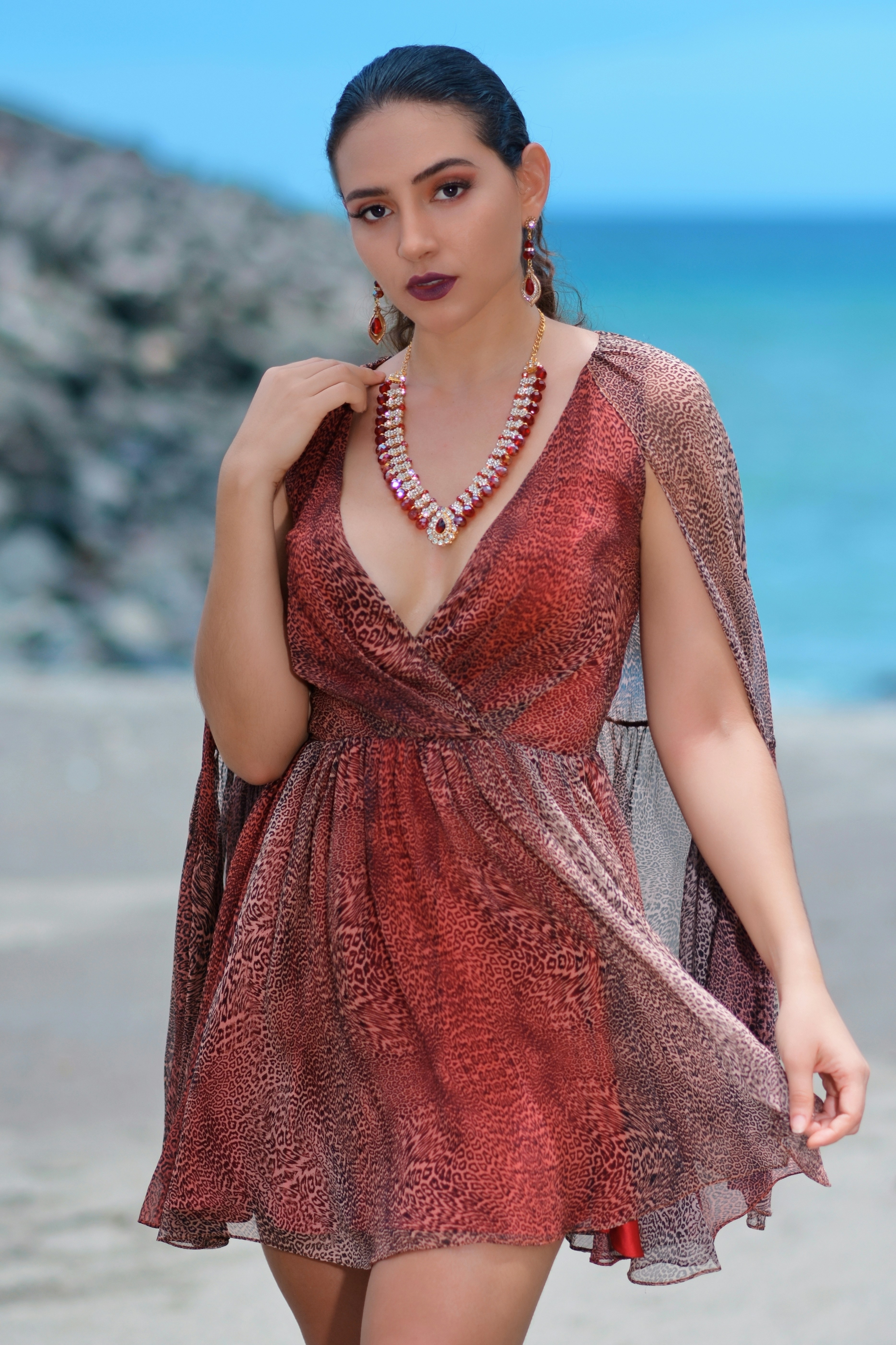 woman in red sleeveless dress