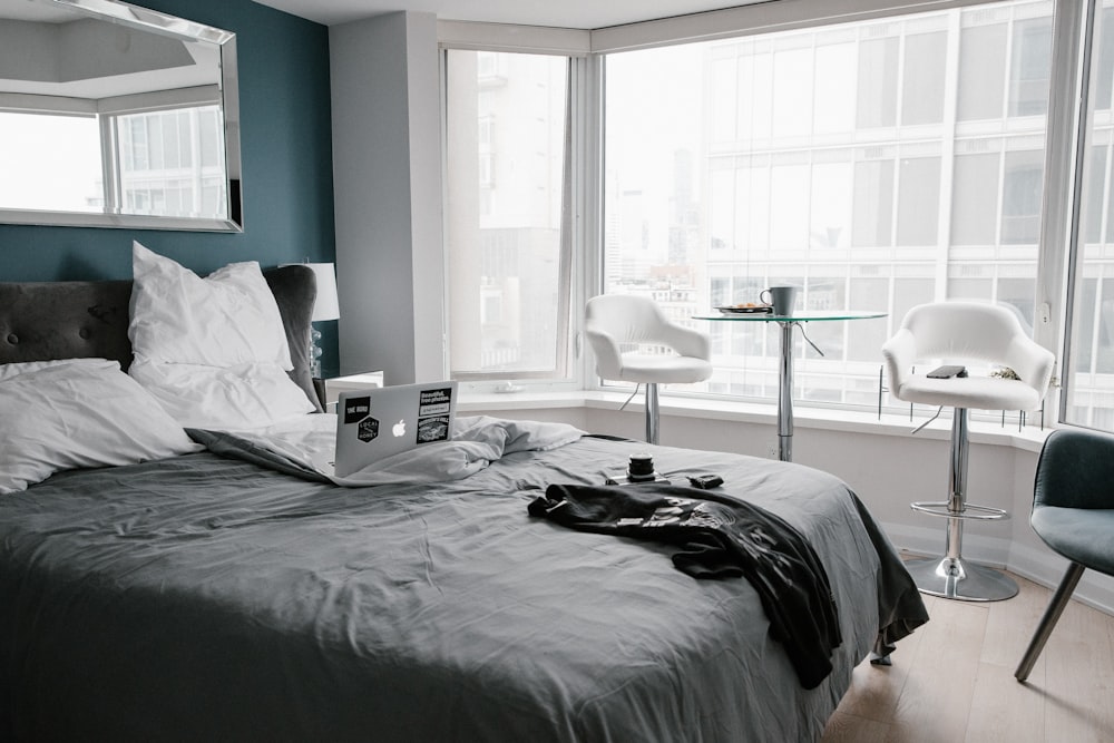 black bed linen near white table