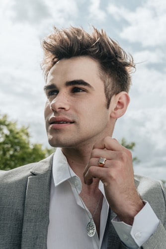 man in gray suit jacket