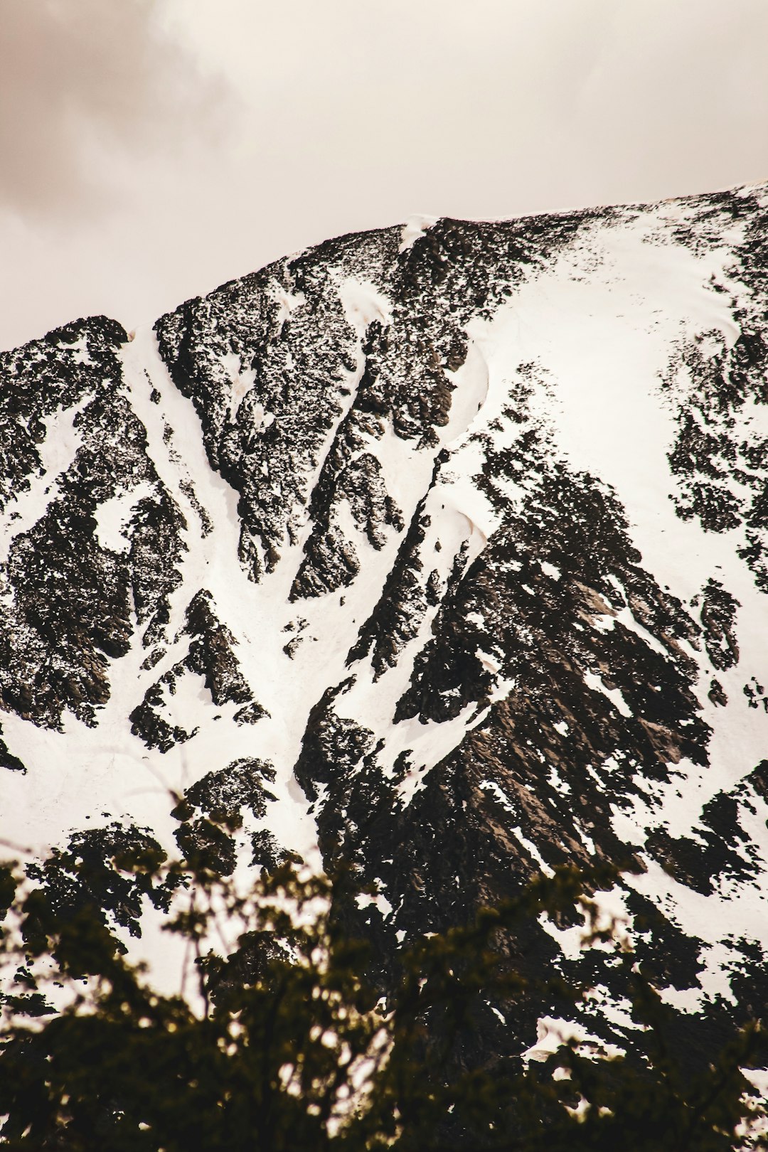 snow covered mountain during daytime