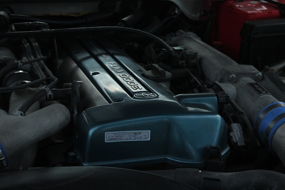 blue and black honda car engine