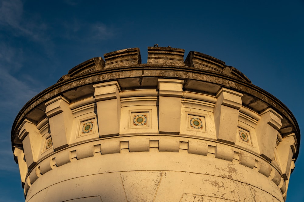 white concrete building under blue sky during daytime