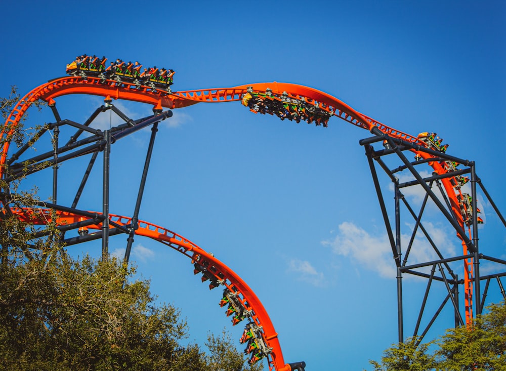 red and black roller coaster rail