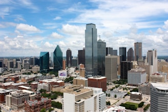 city buildings under blue sky during daytime