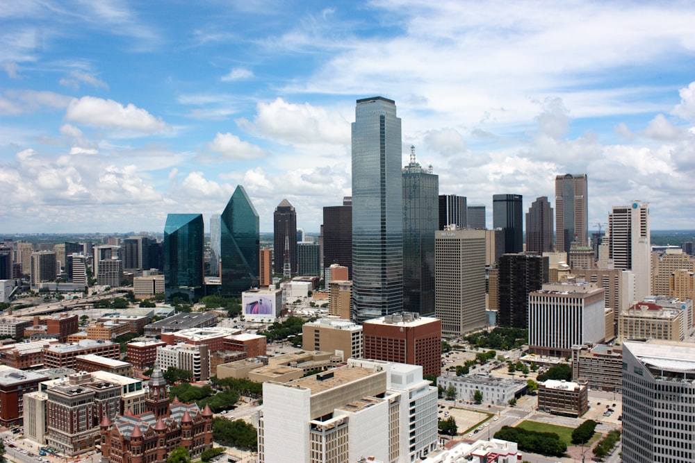 city buildings under blue sky during daytime