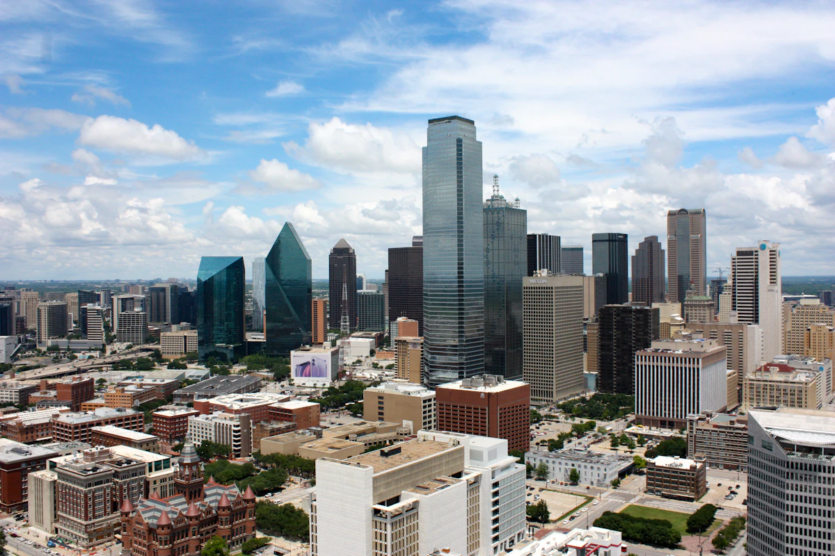 Dallas skyline under a clear daytime sky