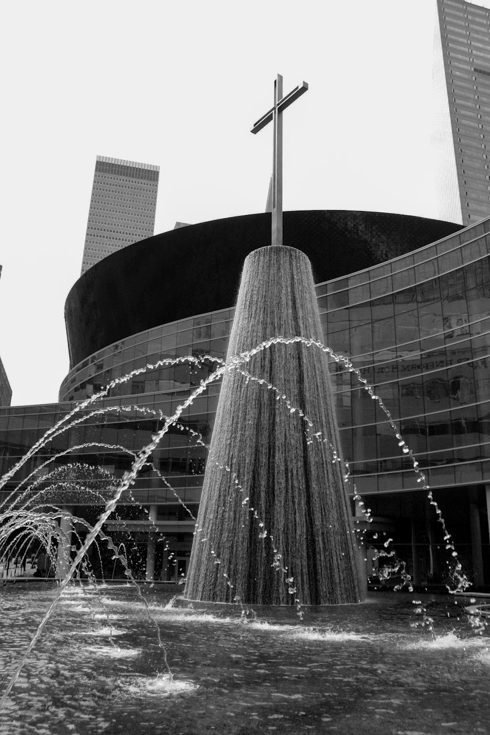 grayscale photo of water fountain