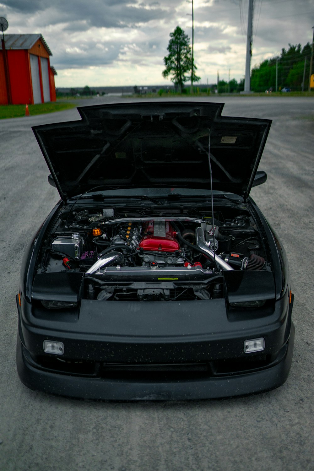 black bmw m 3 parked on parking lot during daytime