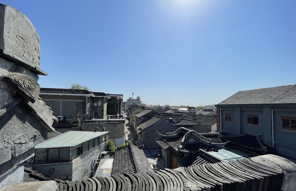 white and black houses under blue sky during daytime