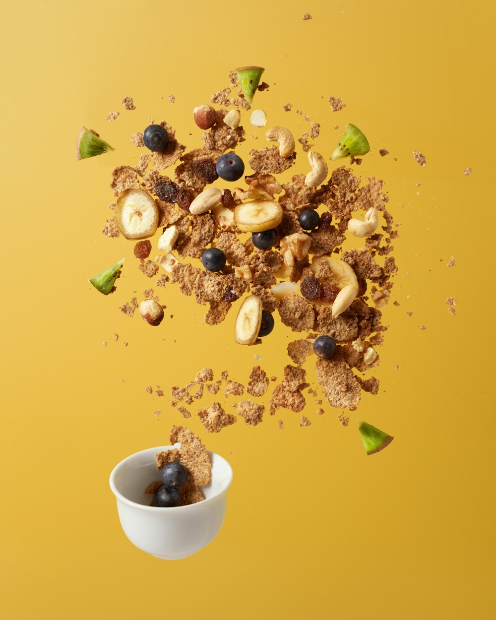 brown nuts on white ceramic bowl