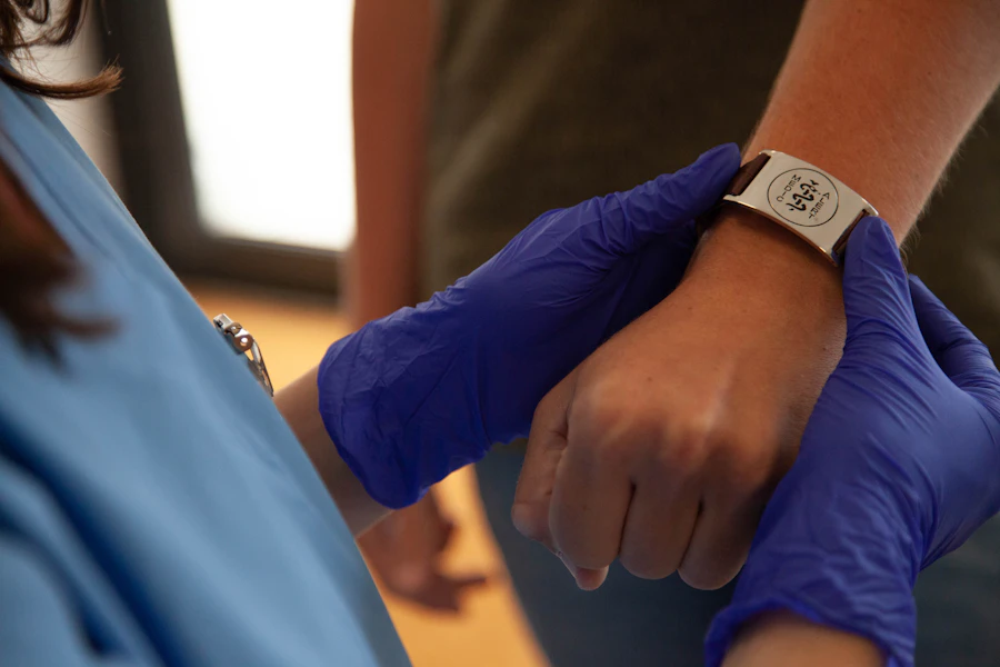 Registered nurse reviewing coursework on a laptop during a break