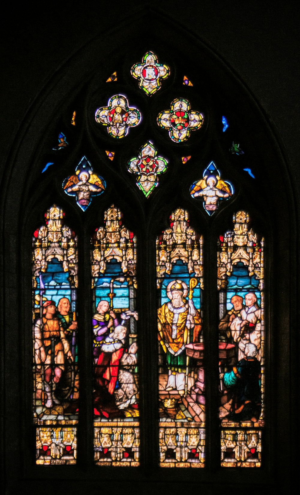 blue red and green floral glass window