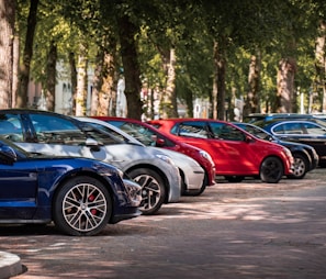 blue and red sports car on road during daytime