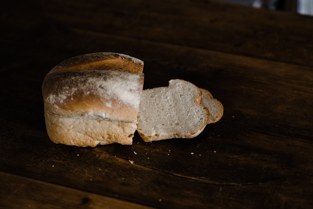 sliced bread on brown wooden table