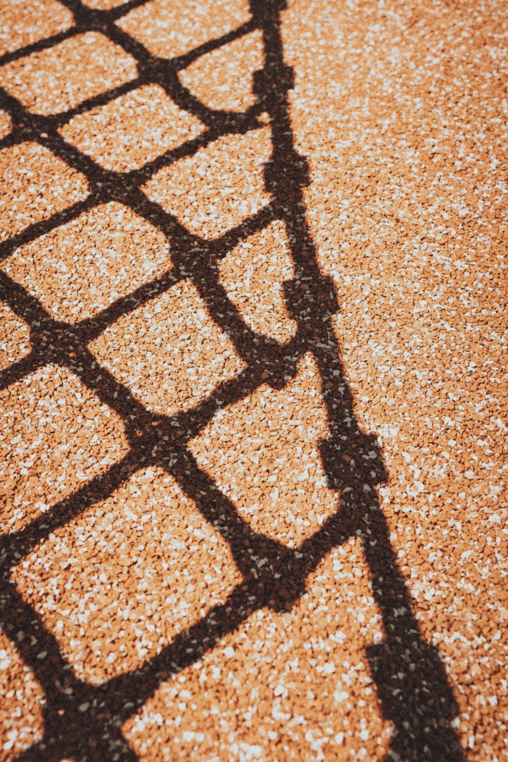 brown and black floor tiles
