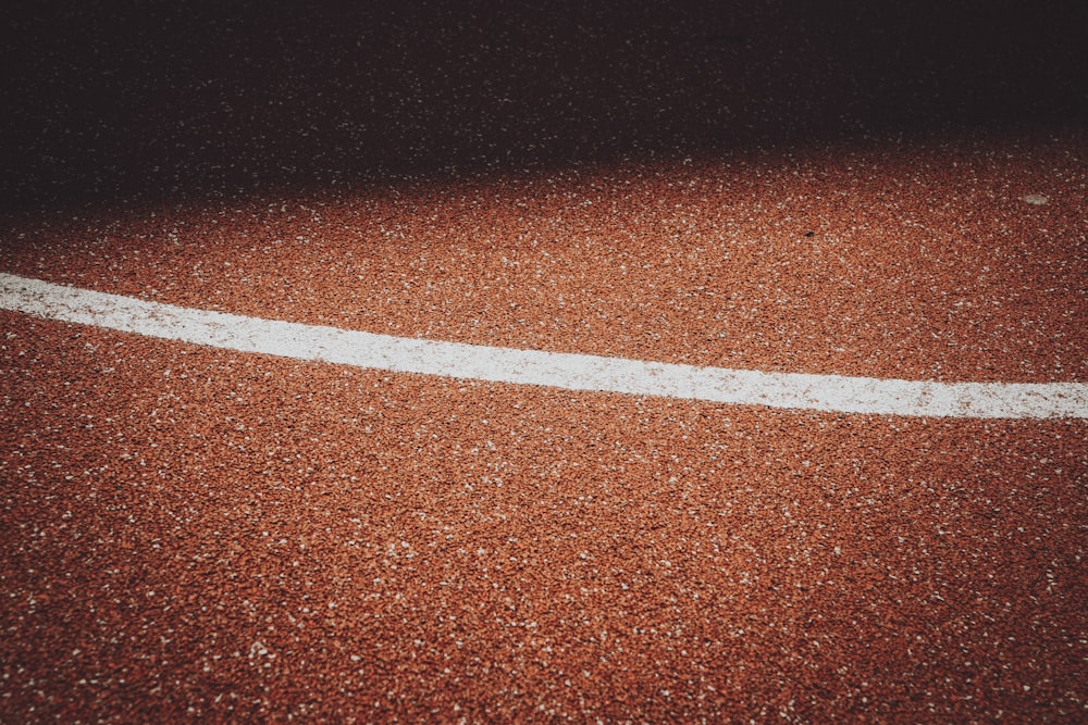 red and white track field