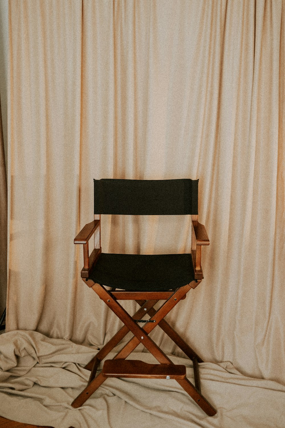 black and brown folding chair