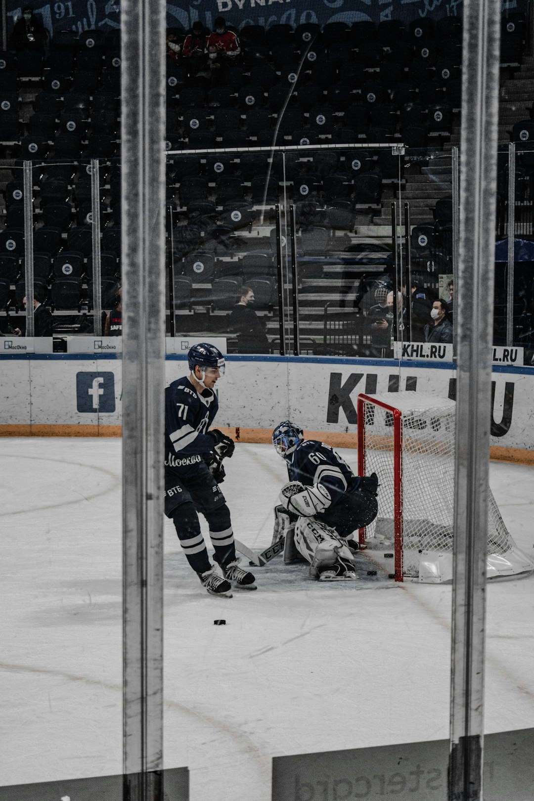 ice hockey players on ice hockey field during daytime