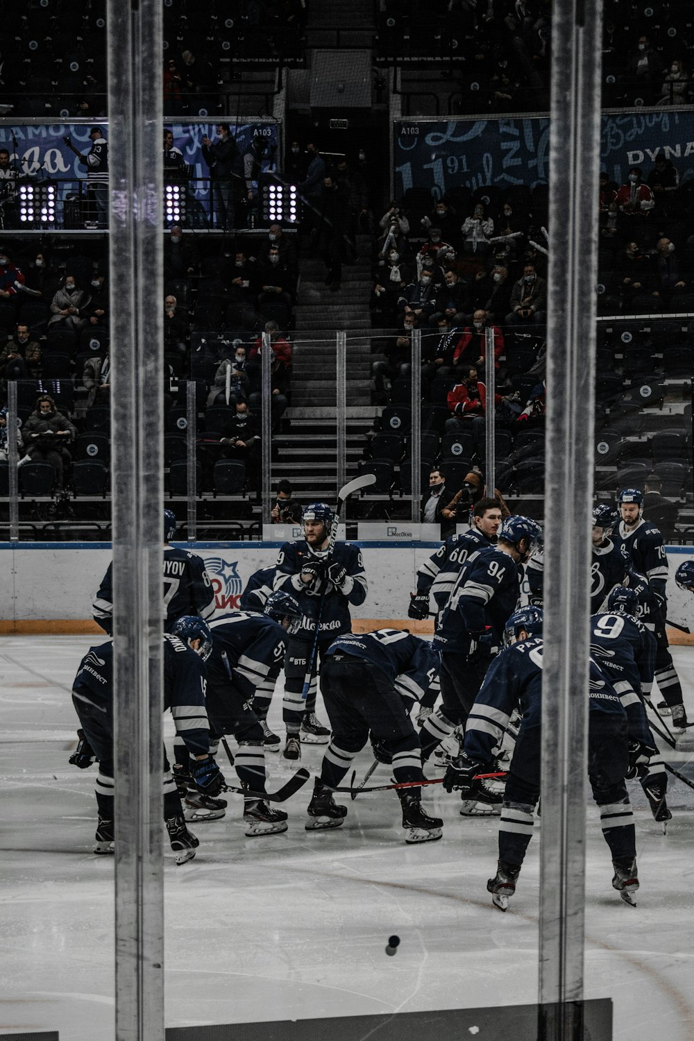 ice hockey players on ice hockey stadium