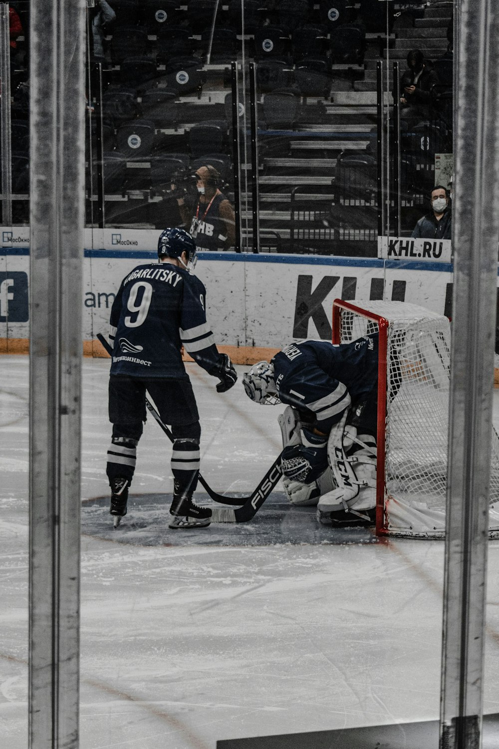 ice hockey players on ice hockey field