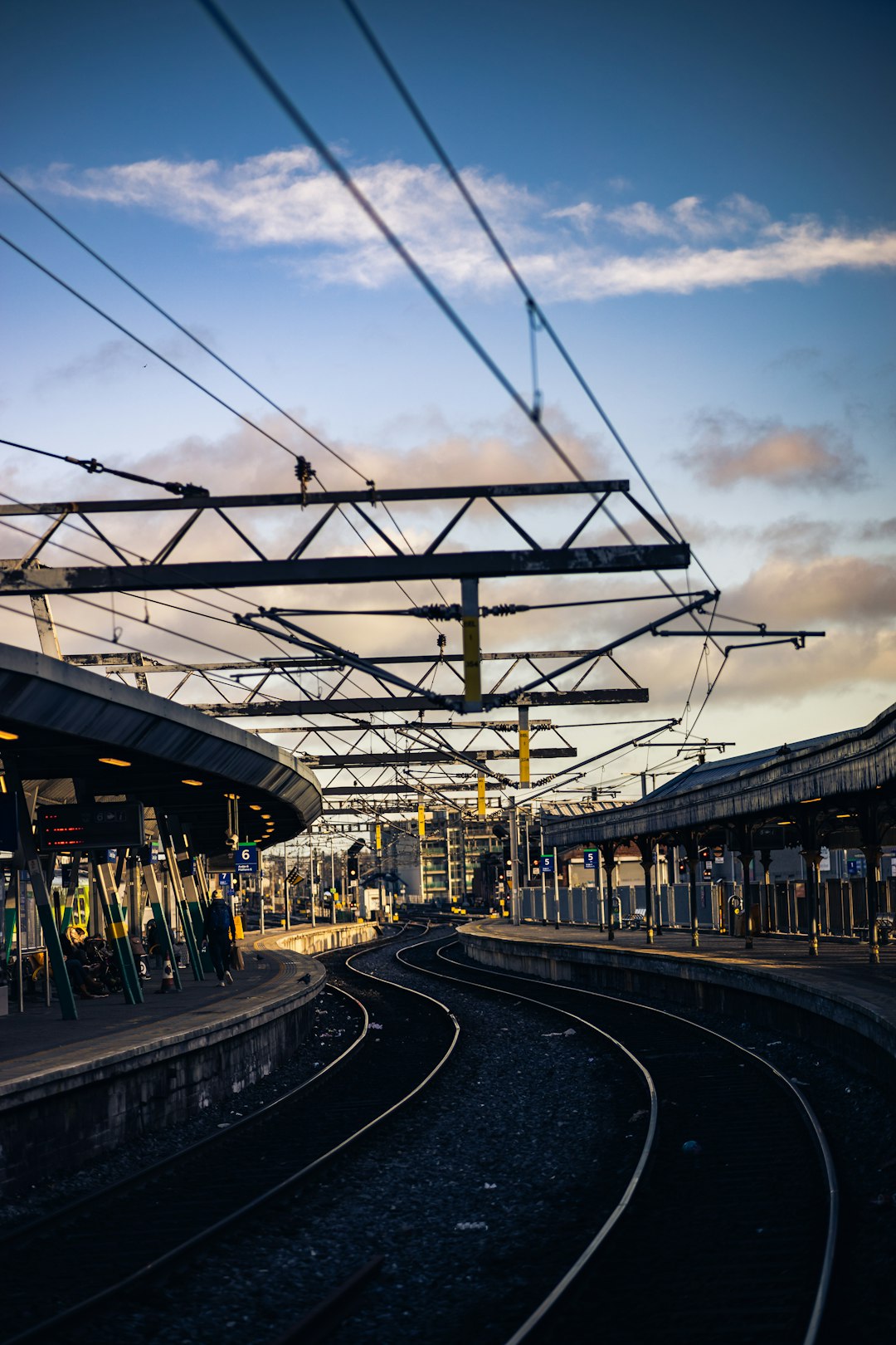 white and yellow train on train station during daytime