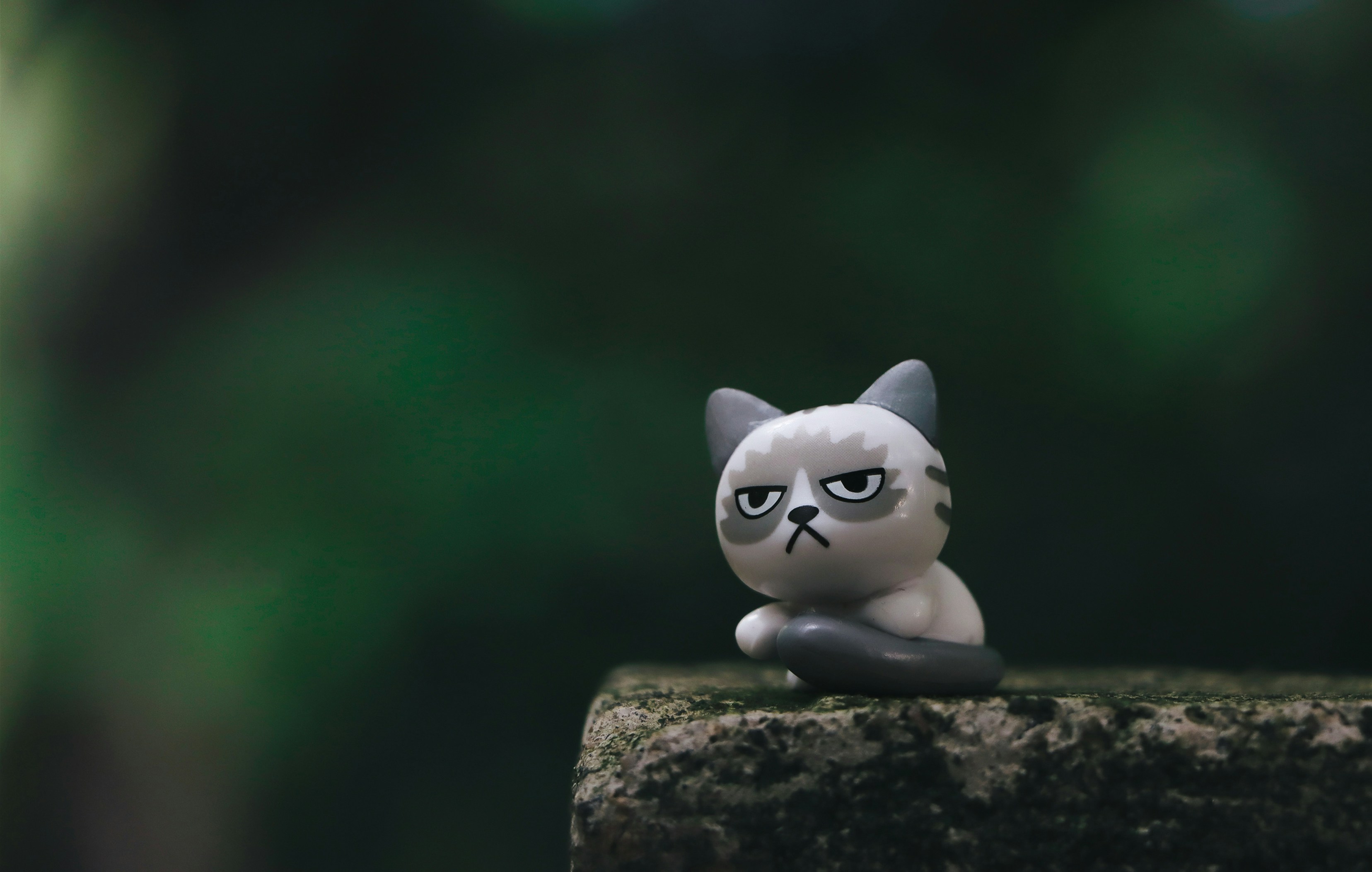 White cat figurine digital pet