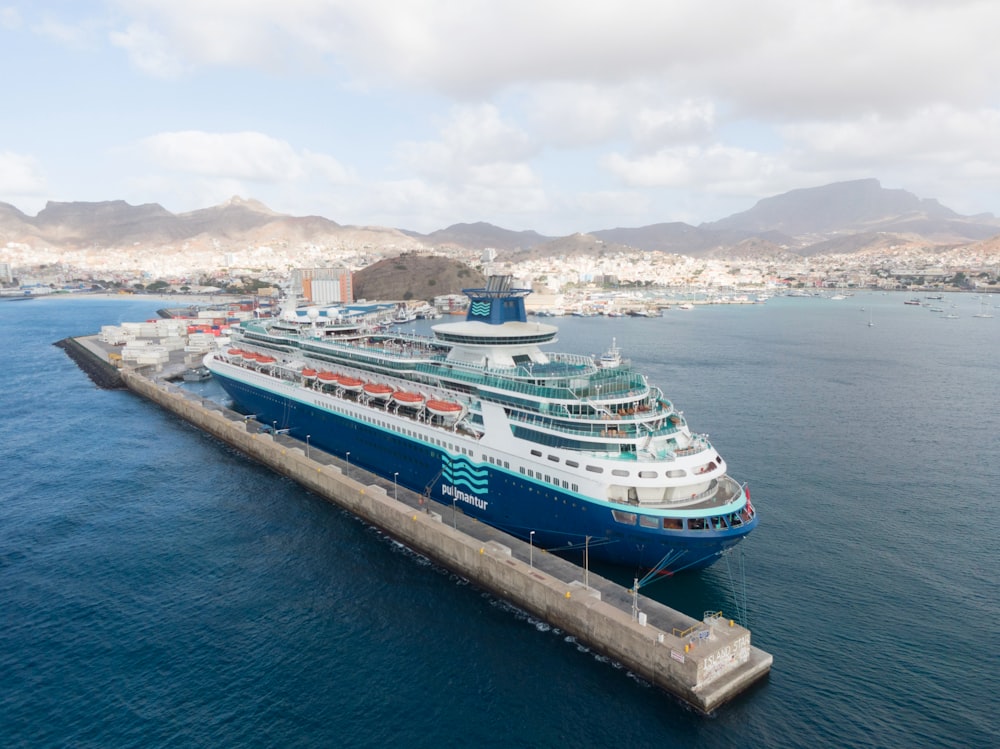 white and blue cruise ship on sea during daytime