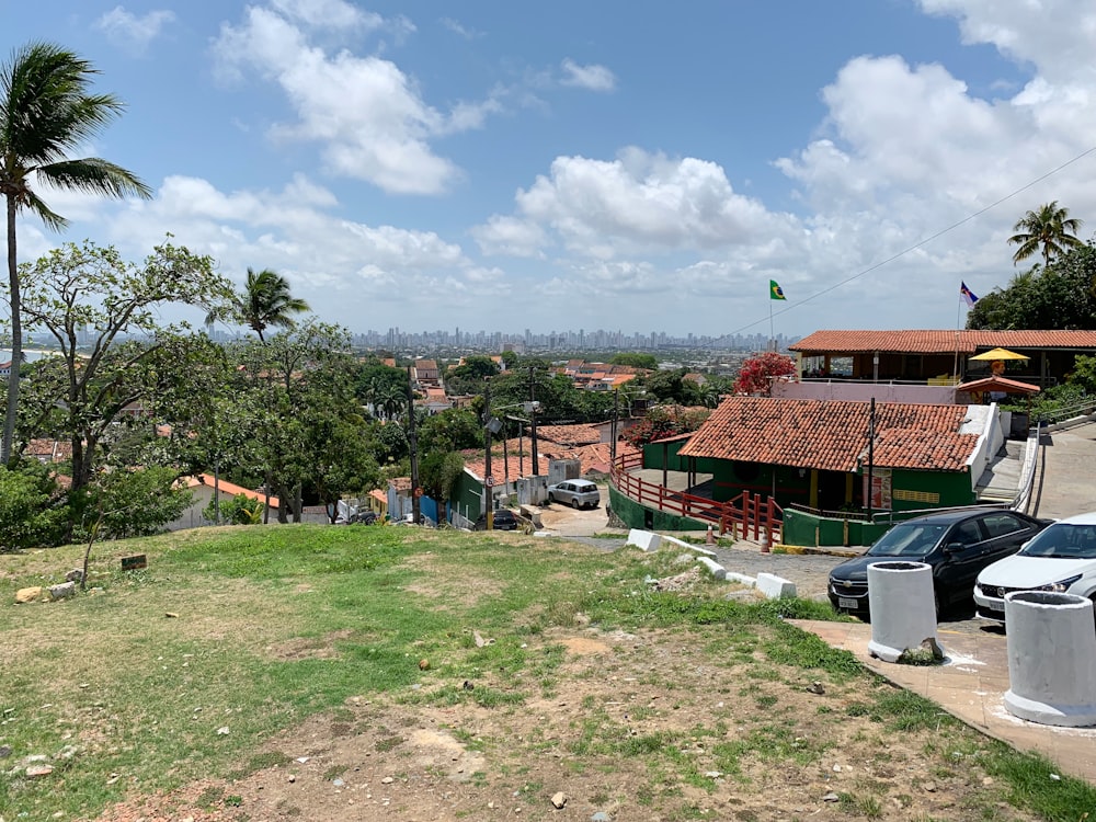 houses and trees under blue sky during daytime