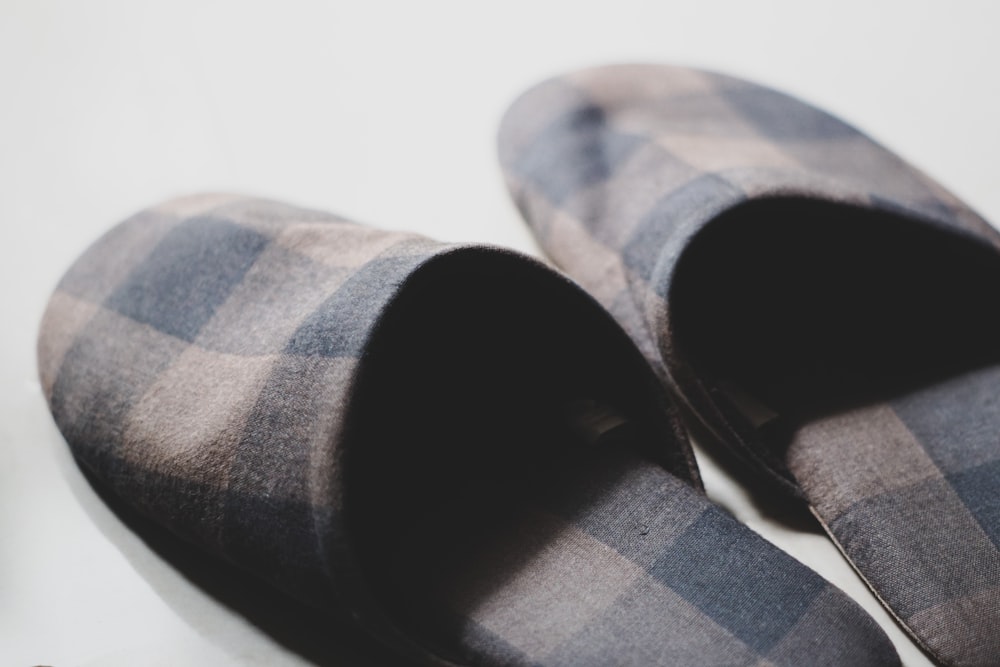 blue and brown plaid textile