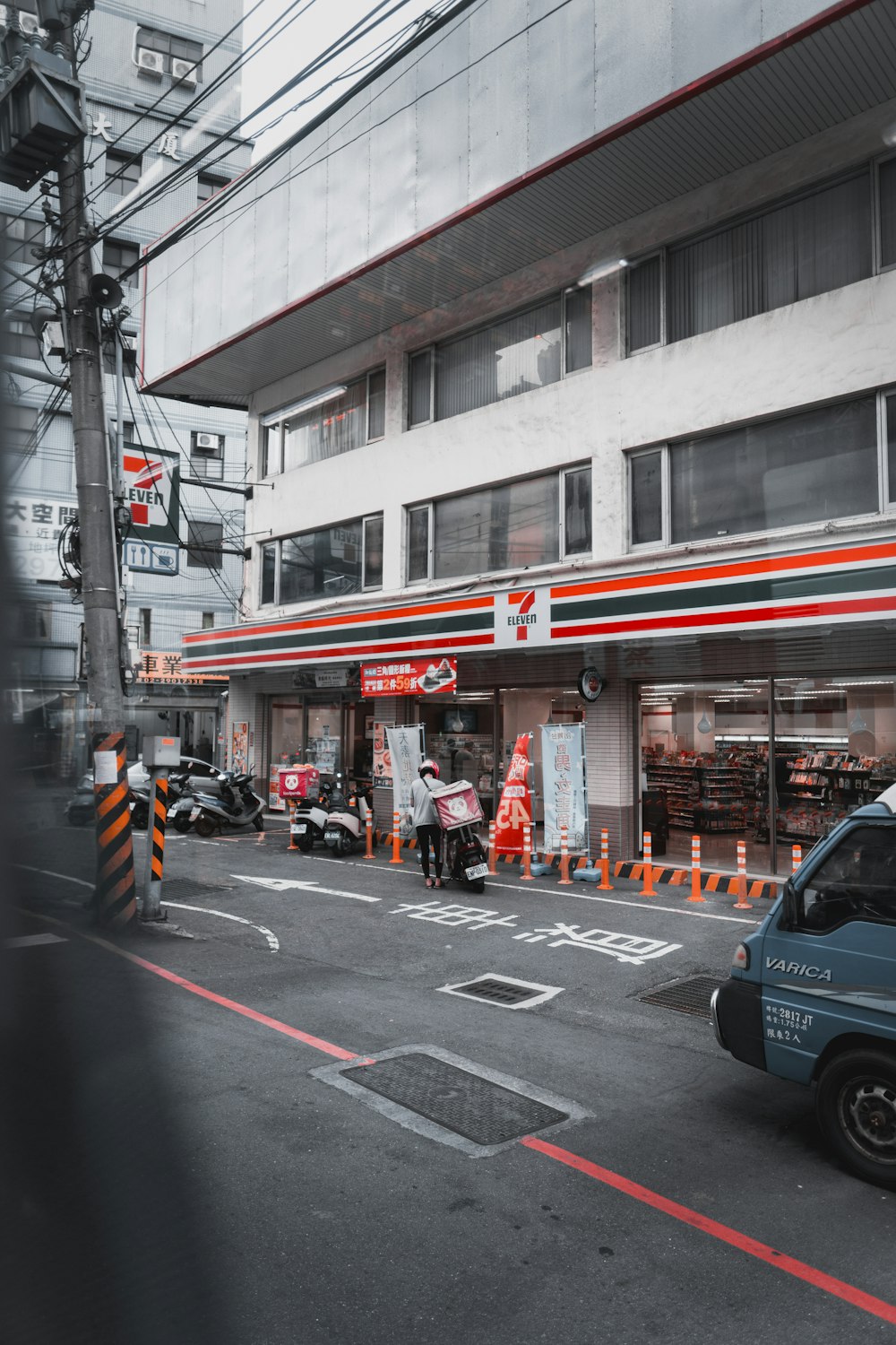 cars parked on street near building during daytime