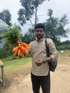 A friendly farmer holding fresh produce in a sunlit field, smiling warmly.