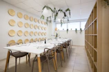 dining table with chairs and plates