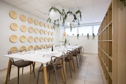 dining table with chairs and plates