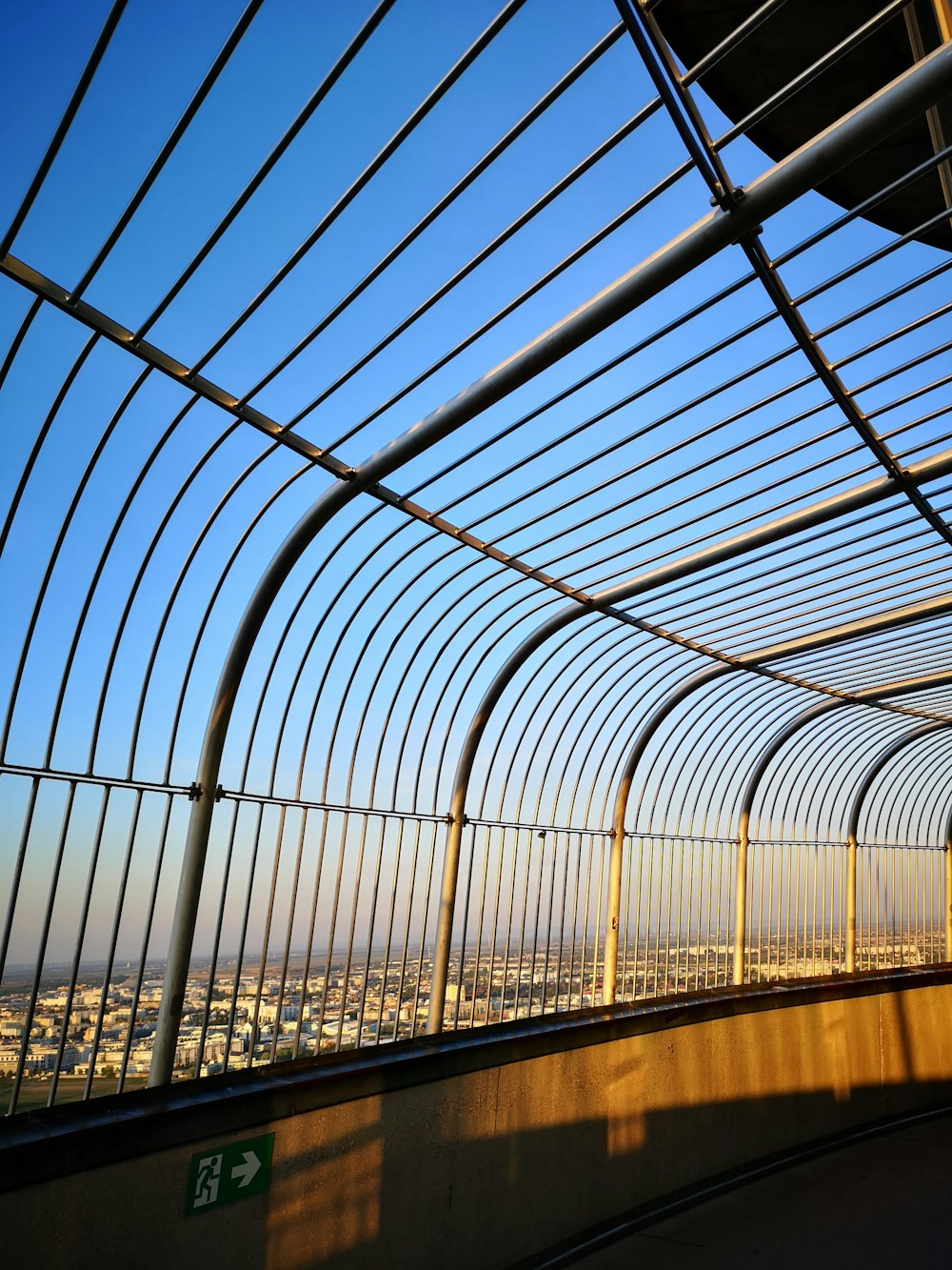 white metal frame with glass roof