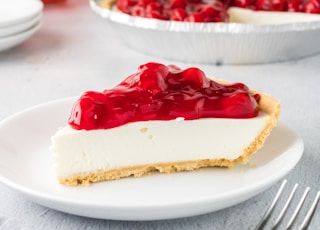 red and white cake on white ceramic plate