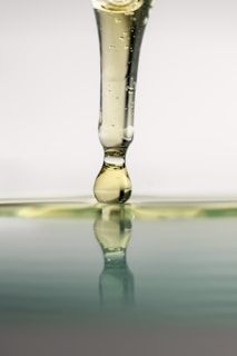 water drop in clear glass bottle