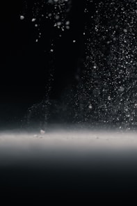 water droplets on glass during night time