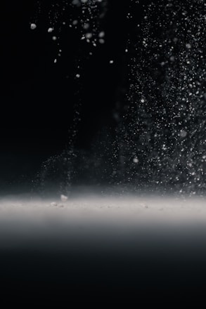 water droplets on glass during night time