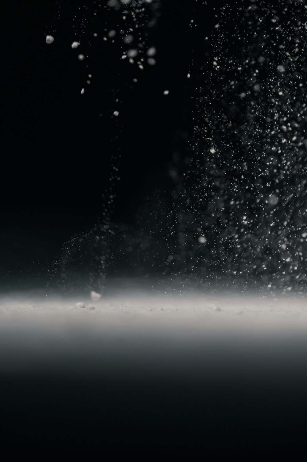 water droplets on glass during night time