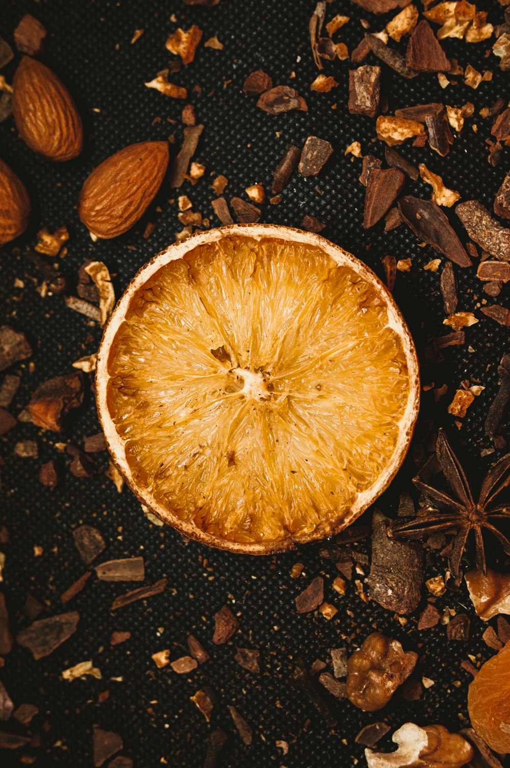 brown round fruit on brown soil