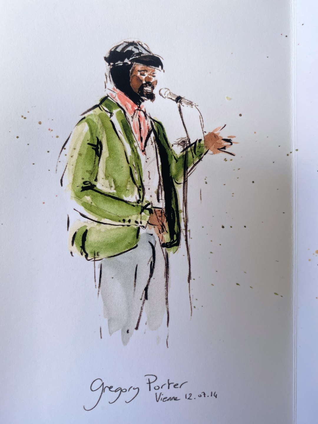 man in green suit holding a stick painting