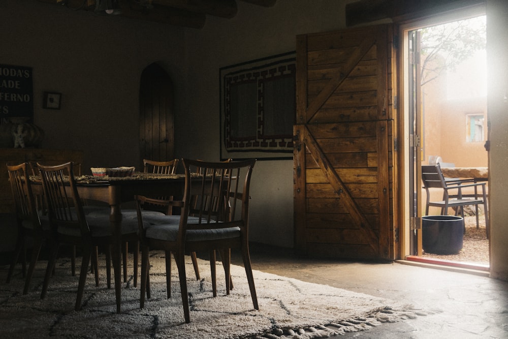 brown wooden table and chairs