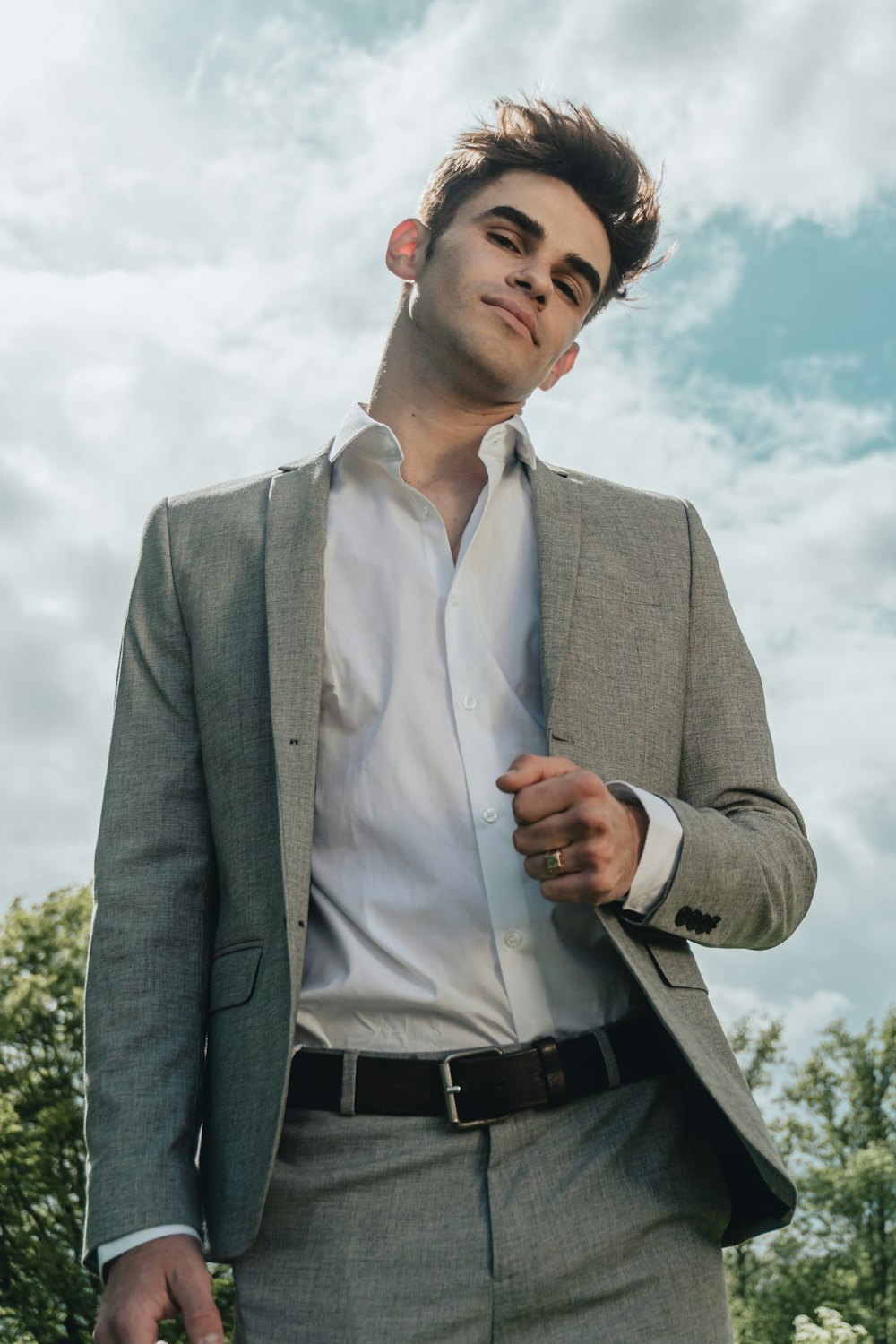 man in gray suit jacket