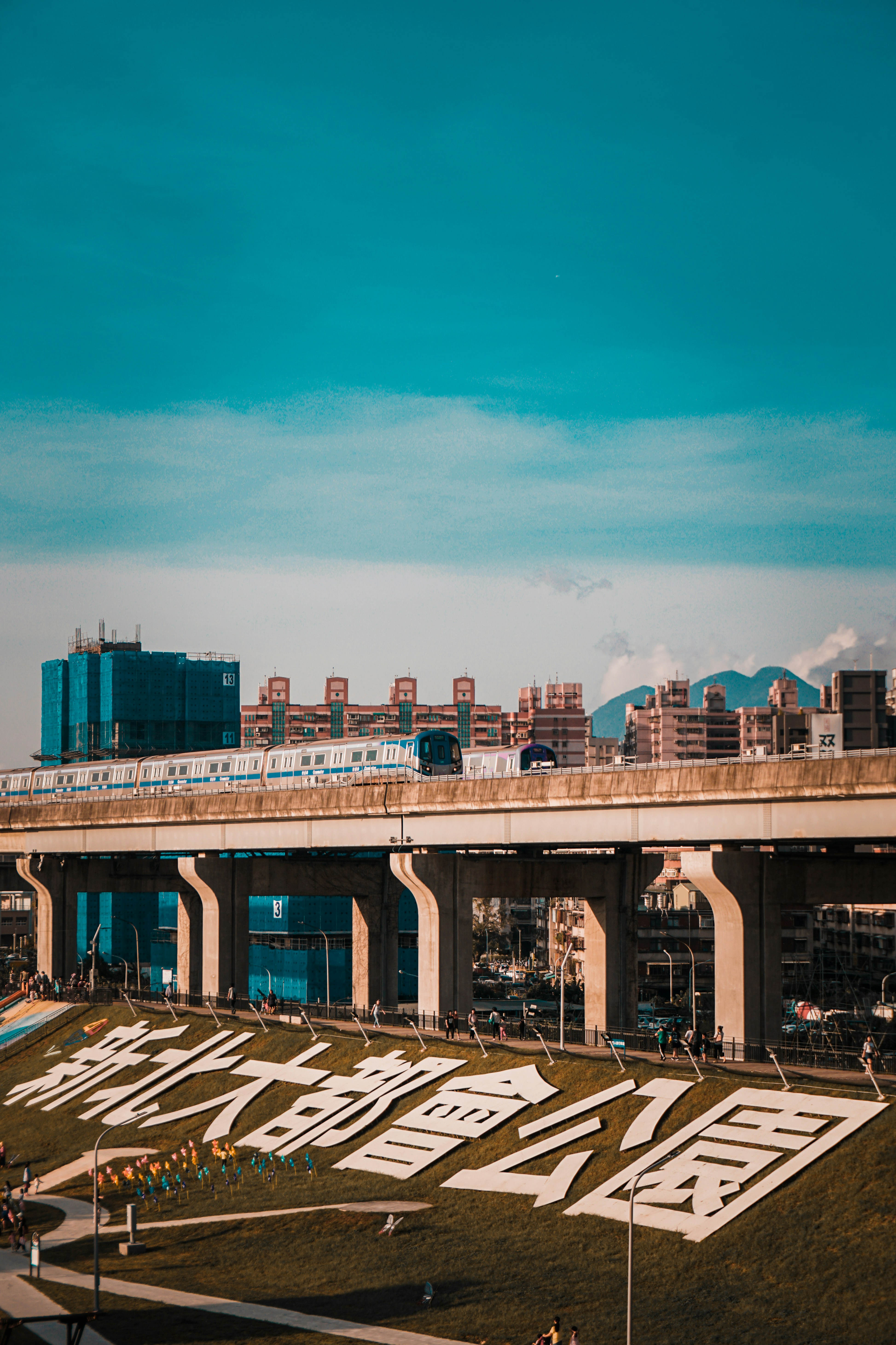 brown and white concrete building under blue sky during daytime