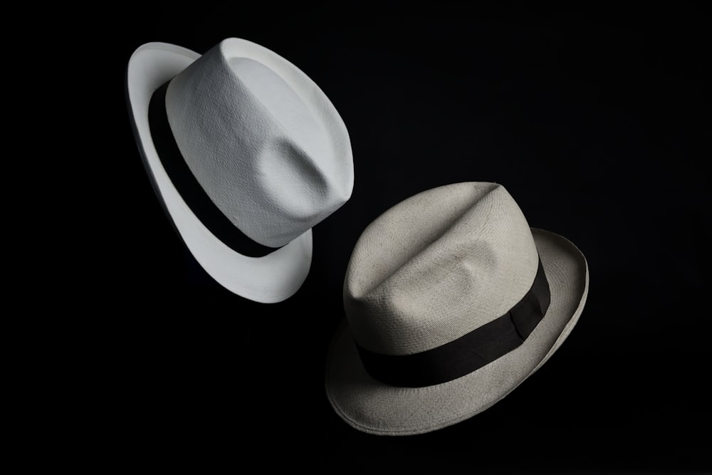 white cowboy hat on black background